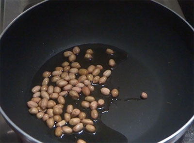 oil and peanuts for tomato chitranna or tomato rice recipe