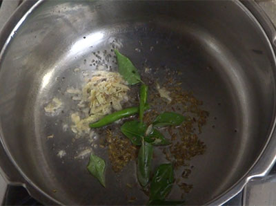 ginger, green chili and curry leaves for tomato rice recipe