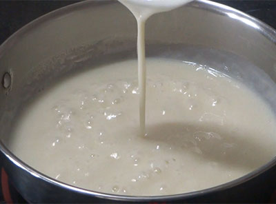 boiling milk and sugar for wheat flour milk kulfi or doodh ice candy