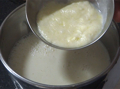 pour blended milk into moulds for wheat flour milk kulfi or doodh ice candy