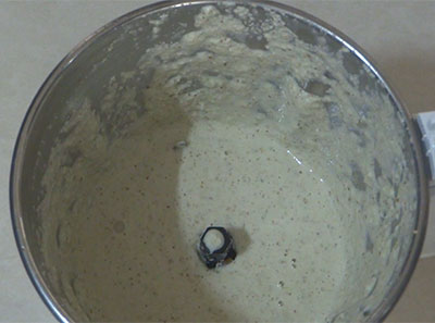 grinding spices for bili sagu or white kurma