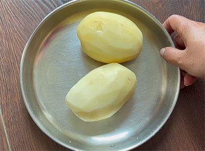 peeled potatoes for Aloo fry or potato side dish