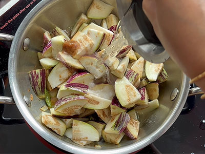 cooking brinjal for badanekayi rasa palya or brinjal gojju recipe