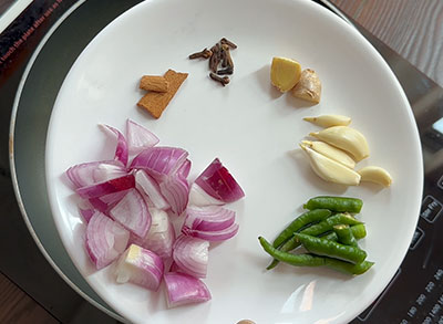 masala ingredients for batani kurma or green peas curry recipe