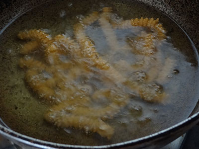 frying benne murukku or butter chakli