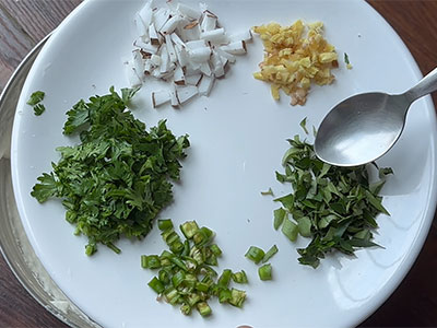 ginger, leaves, coconut and green chillies for bonda soup recipe