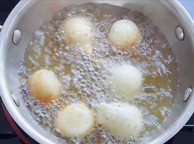 frying golibaje or mangalore bajji till golden brown