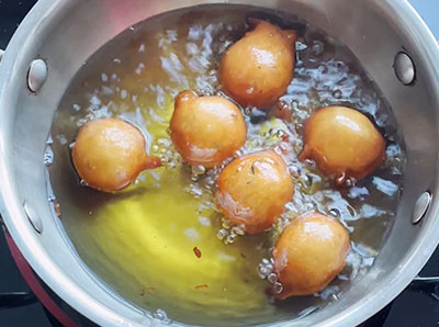 frying golibaje or mangalore bajji till golden brown