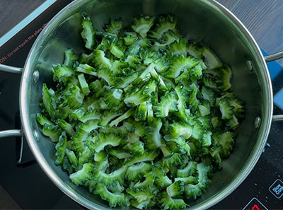 Chopped bitter gourd for hagalakayi palya or bitter gourd stir fry