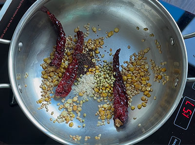 frying spices for kayi gojju or coconut gojju recipe