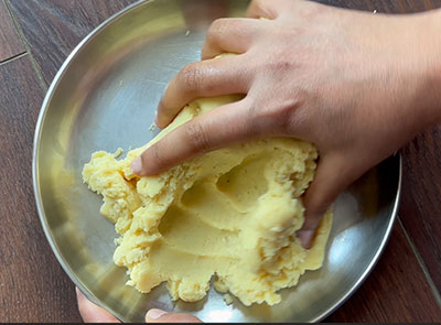 kneading the dough for the milk powder peda recipe